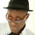 [Picture of Neville Staple]
