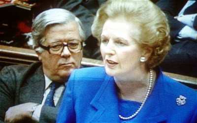 [Picture of Geoffrey Howe and Margaret Thatcher]