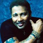 [Picture of Aaron Neville]